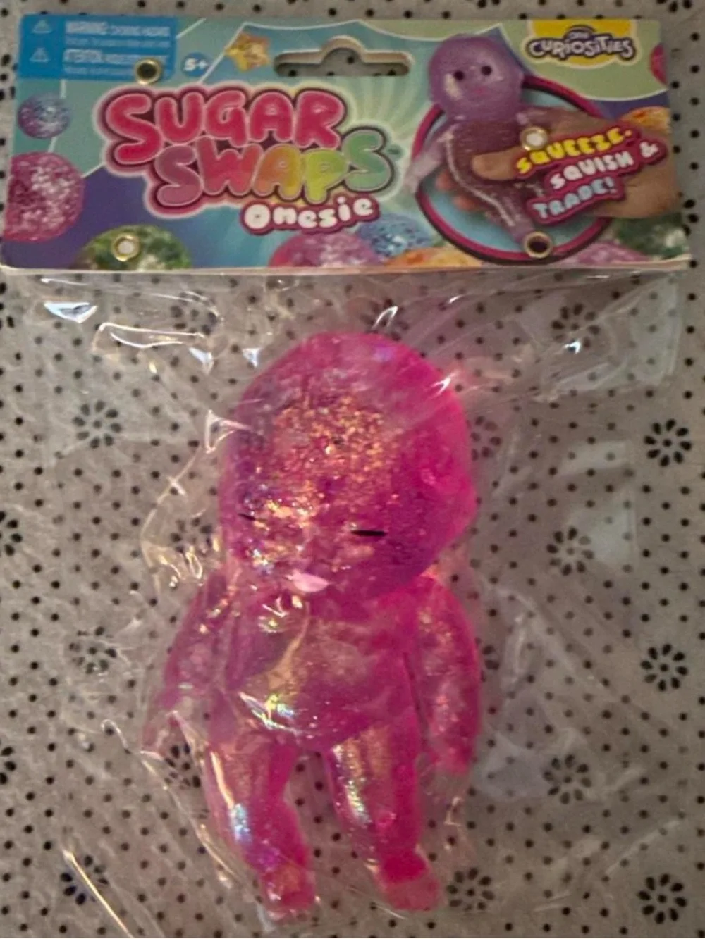 Sugar Swaps Onesie Squishy Sensory Toy - Pink Glitter